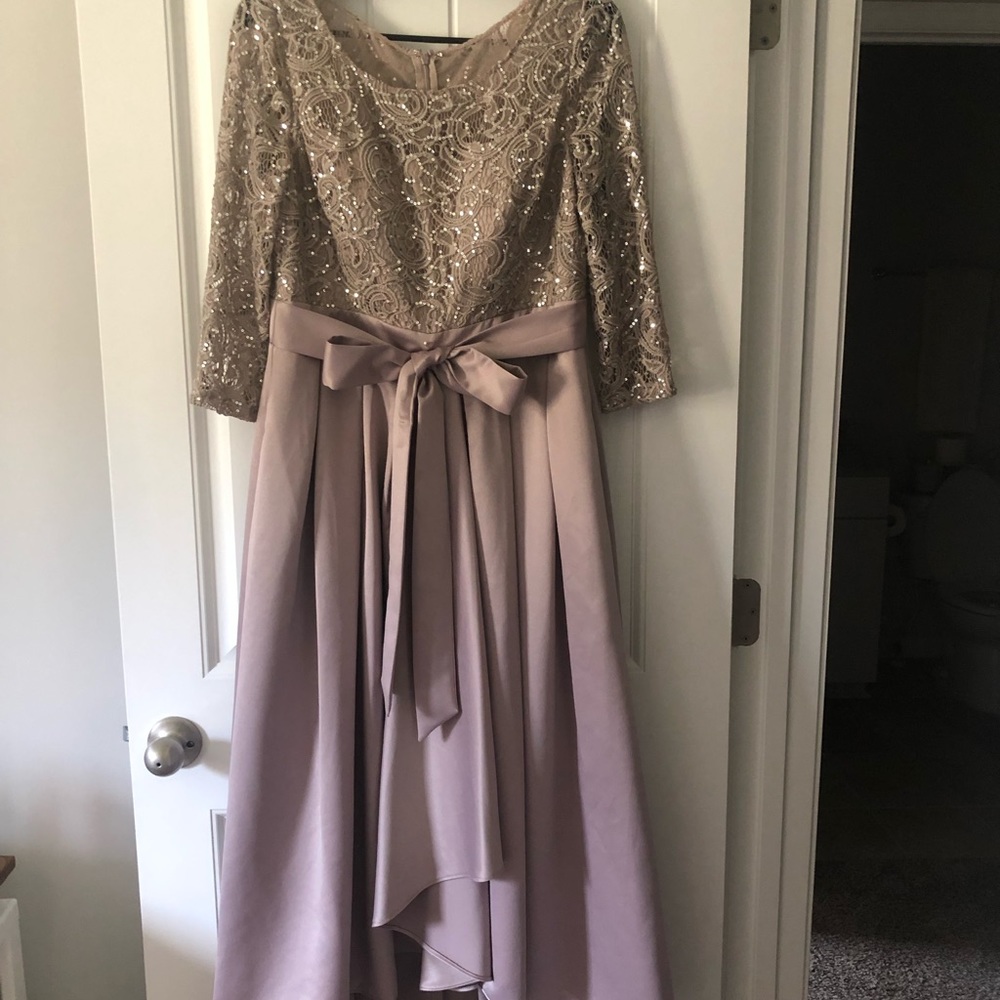 Evening or formal day dress.